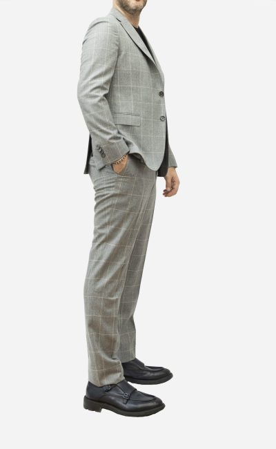 LUIGI BIANCHI SARTORIA  Abito monopetto in lana motivo geometrico